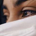 shallow focus of a woman's sad eyes